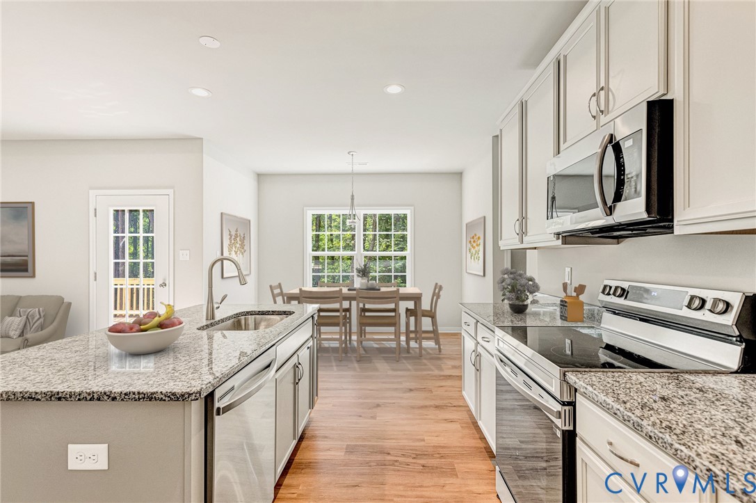 8355 Patrick Henry Boulevard Mechanicsville, VA 23116 - Photo 9 of 48 Virtually staged - kitchen with appliances with st