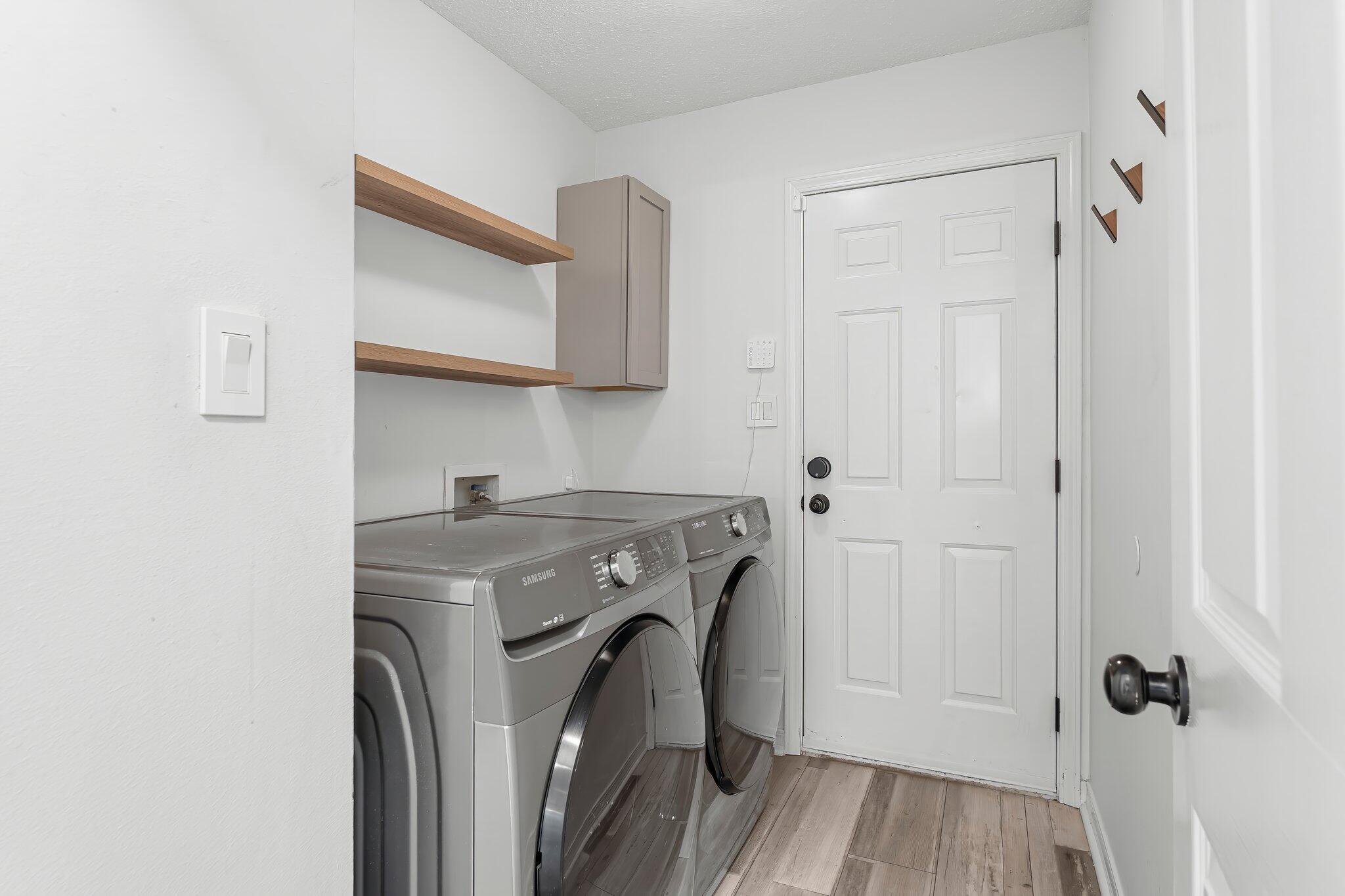 162 Beacon Way Santa Rosa Beach, FL 32459 - Photo 15 of 41 a utility room with dryer and washer