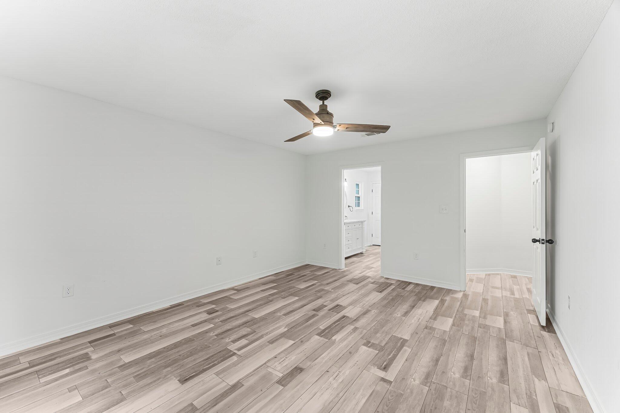 162 Beacon Way Santa Rosa Beach, FL 32459 - Photo 16 of 41 a view of empty room with wooden floor