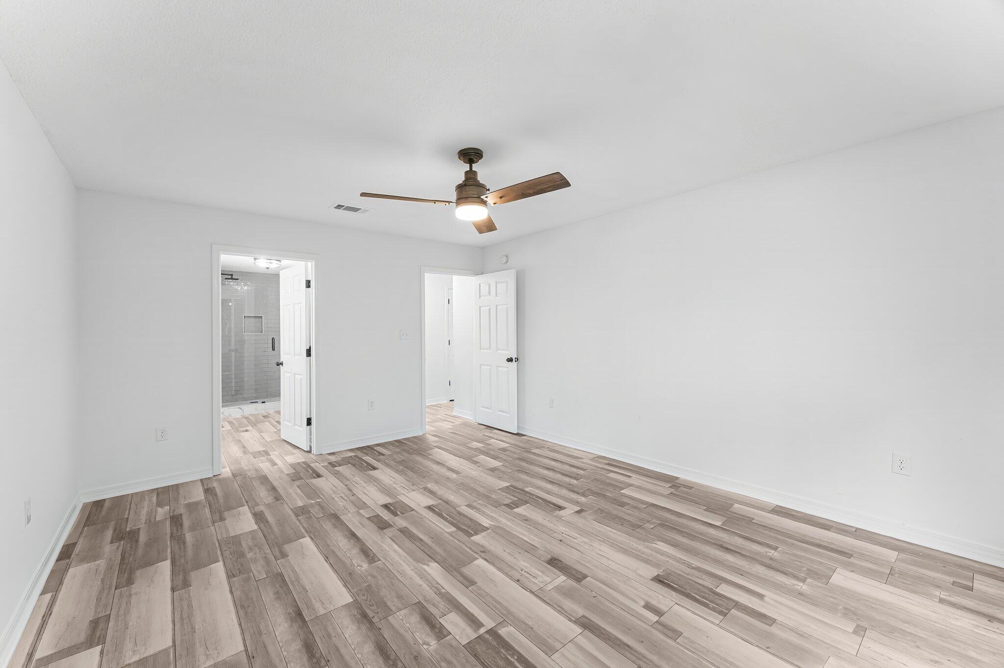 162 Beacon Way Santa Rosa Beach, FL 32459 - Photo 17 of 41 a view of a room with a ceiling fan