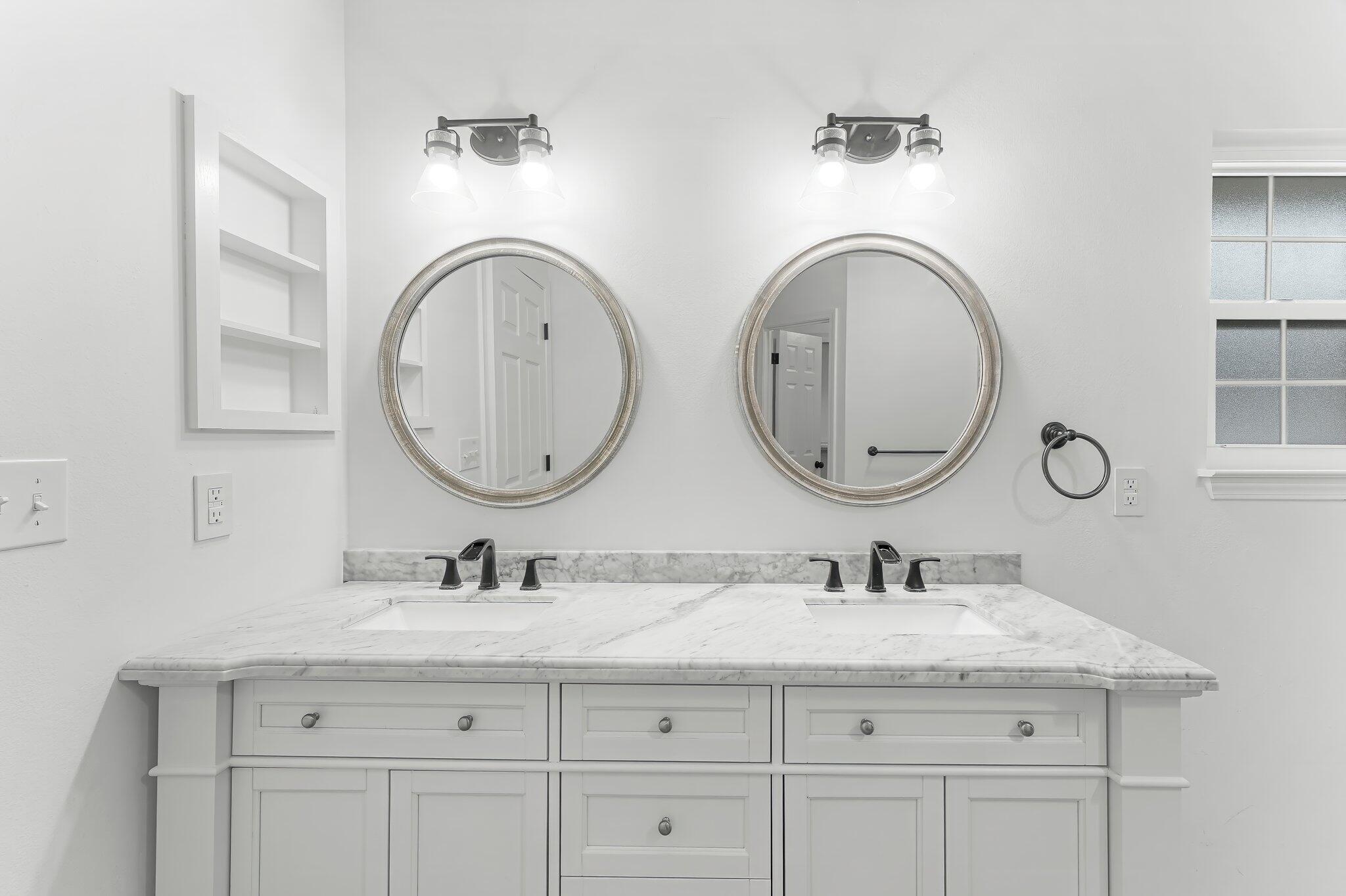 162 Beacon Way Santa Rosa Beach, FL 32459 - Photo 18 of 41 a bathroom with a granite countertop double vanity sinks and a mirror
