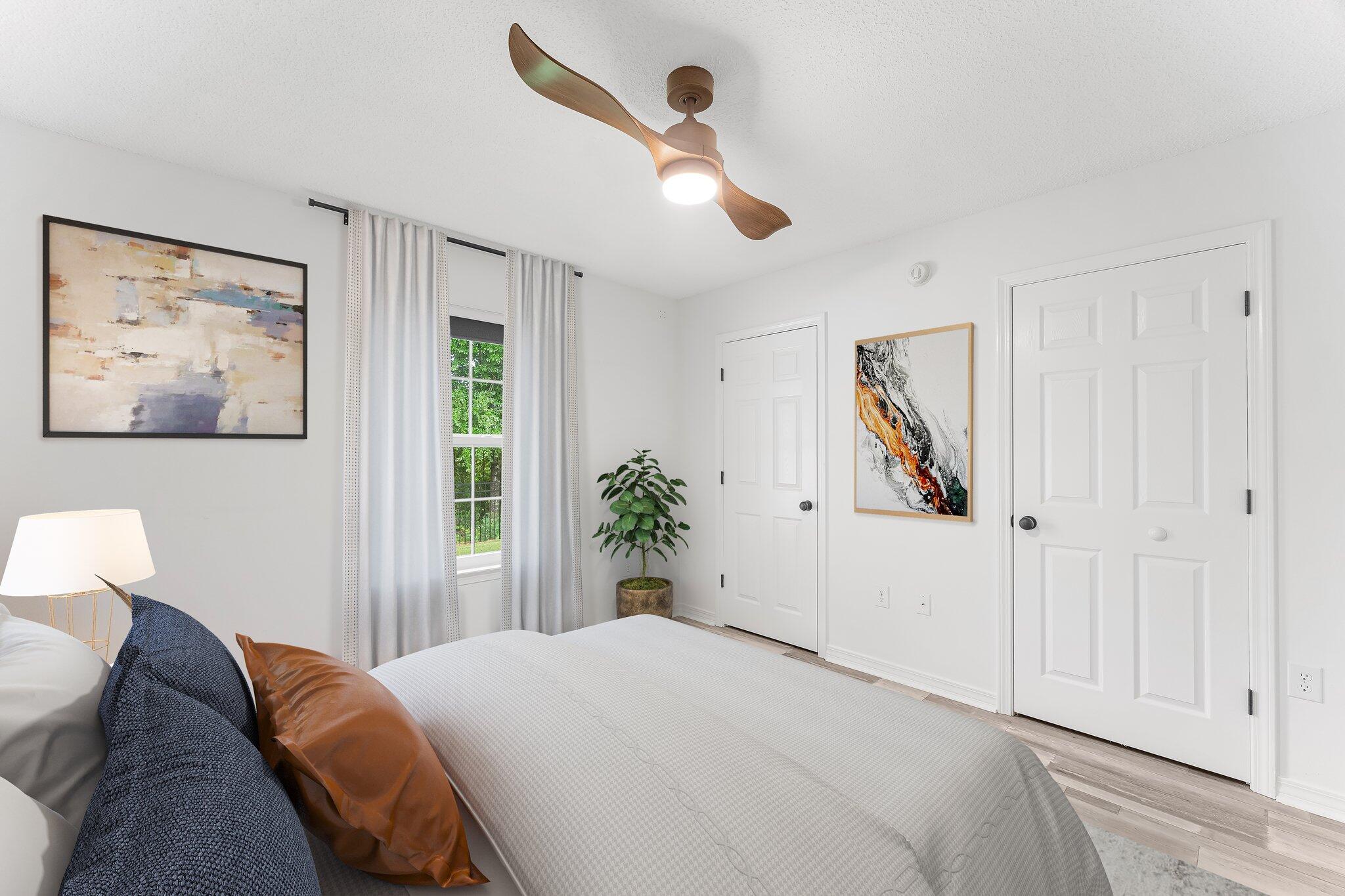 162 Beacon Way Santa Rosa Beach, FL 32459 - Photo 20 of 41 a bedroom with a bed and a painting on the wall