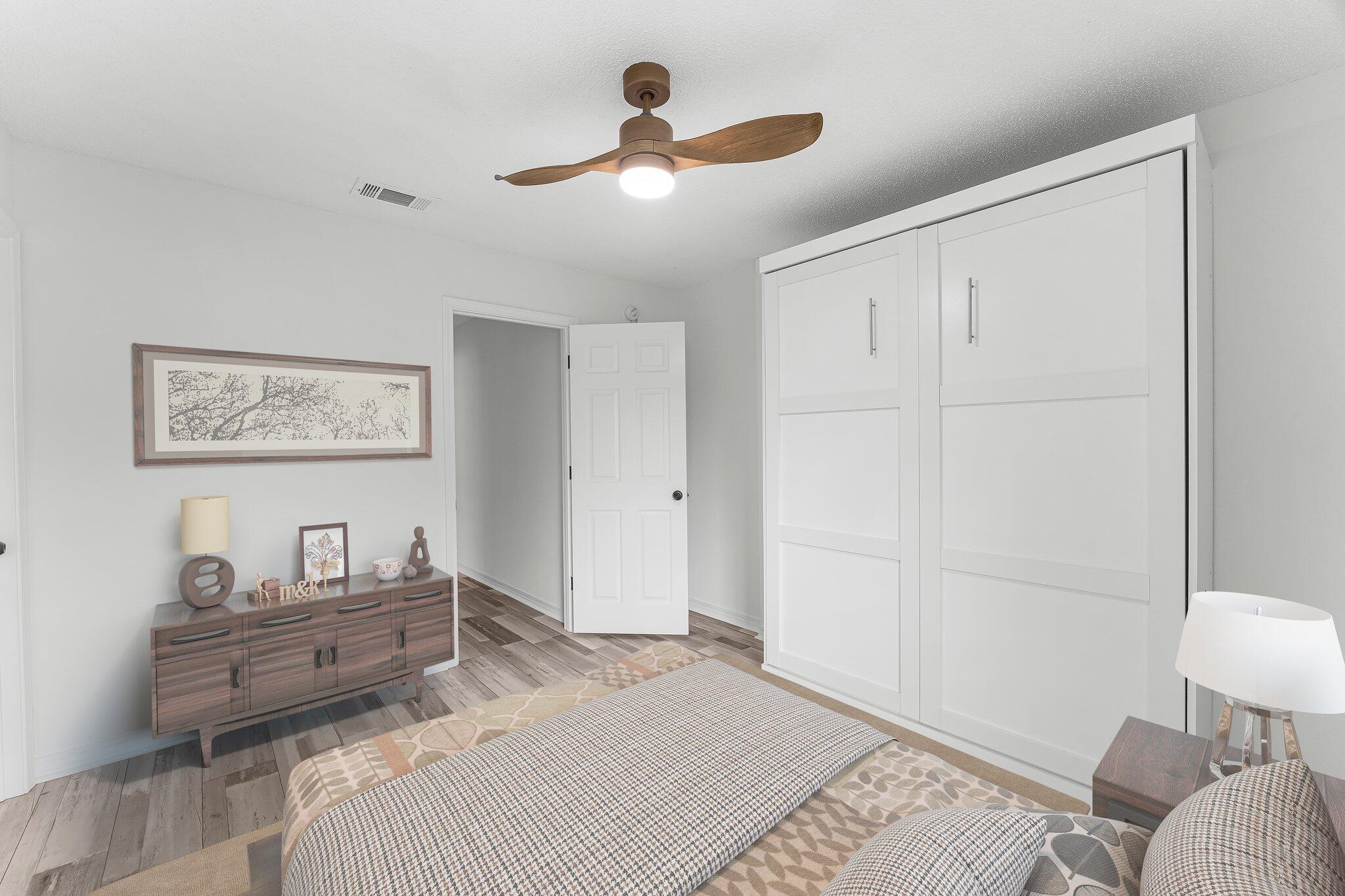 162 Beacon Way Santa Rosa Beach, FL 32459 - Photo 26 of 41 a bedroom with a bed and a lamp on dresser