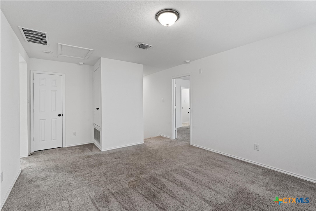 204 Benmyrtle Trail Georgetown, TX 78626 - Photo 20 of 35 wooden floor in an empty room