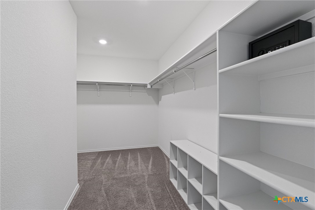 204 Benmyrtle Trail Georgetown, TX 78626 - Photo 25 of 35 a view of an empty walk in closet