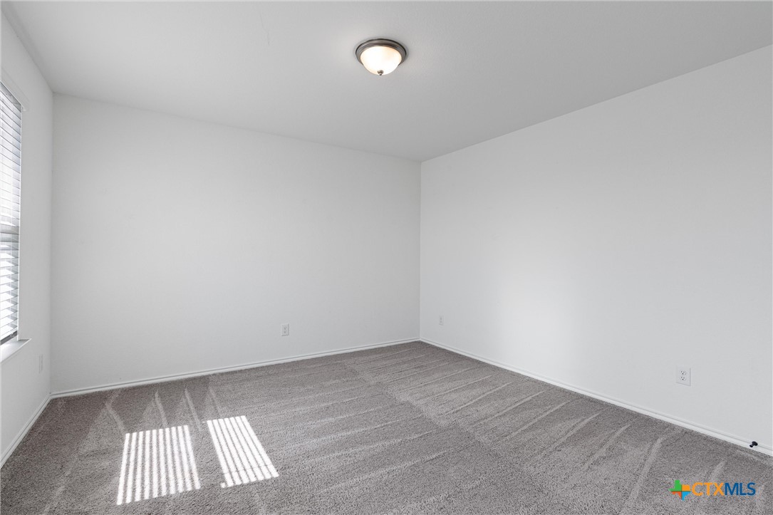 204 Benmyrtle Trail Georgetown, TX 78626 - Photo 26 of 35 an empty room with a window