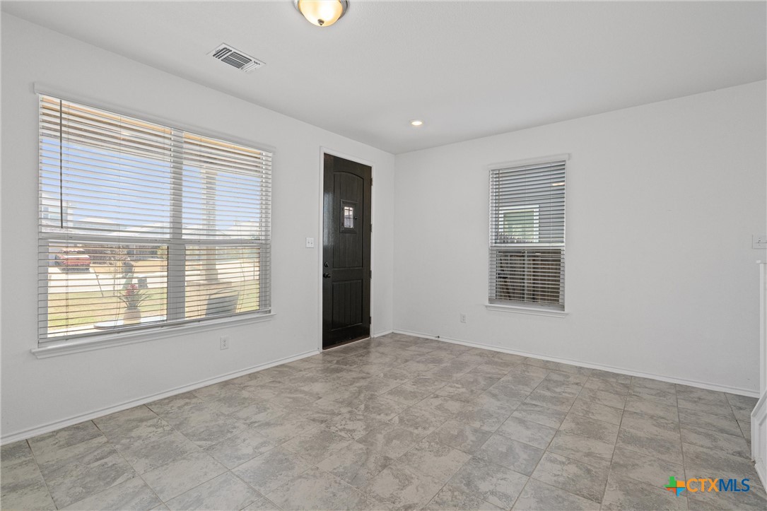 204 Benmyrtle Trail Georgetown, TX 78626 - Photo 6 of 35 a view of an empty room with a window