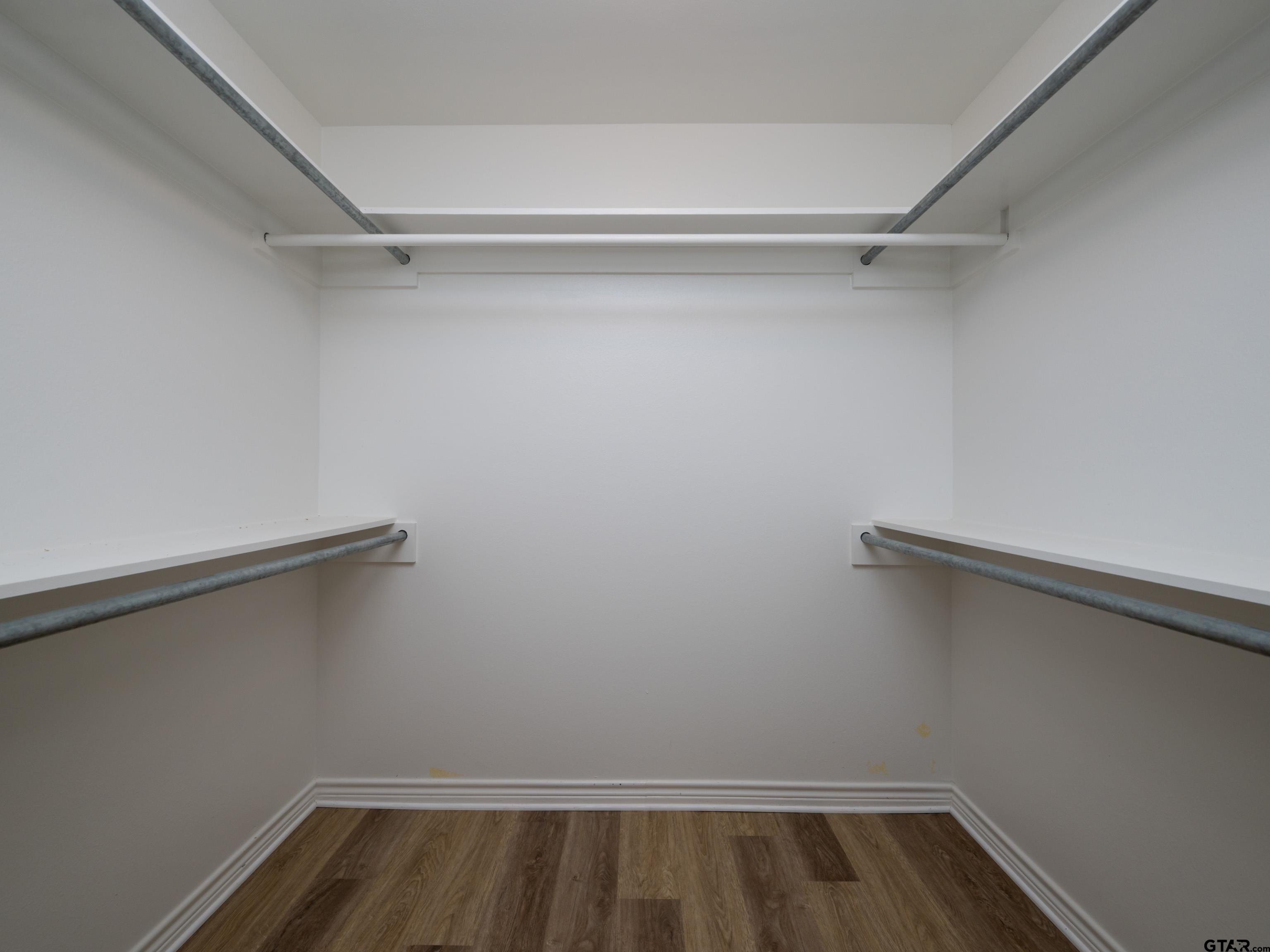 1521 Rice Road Tyler, TX 75703 - Photo 18 of 27 a view of an empty walk in closet