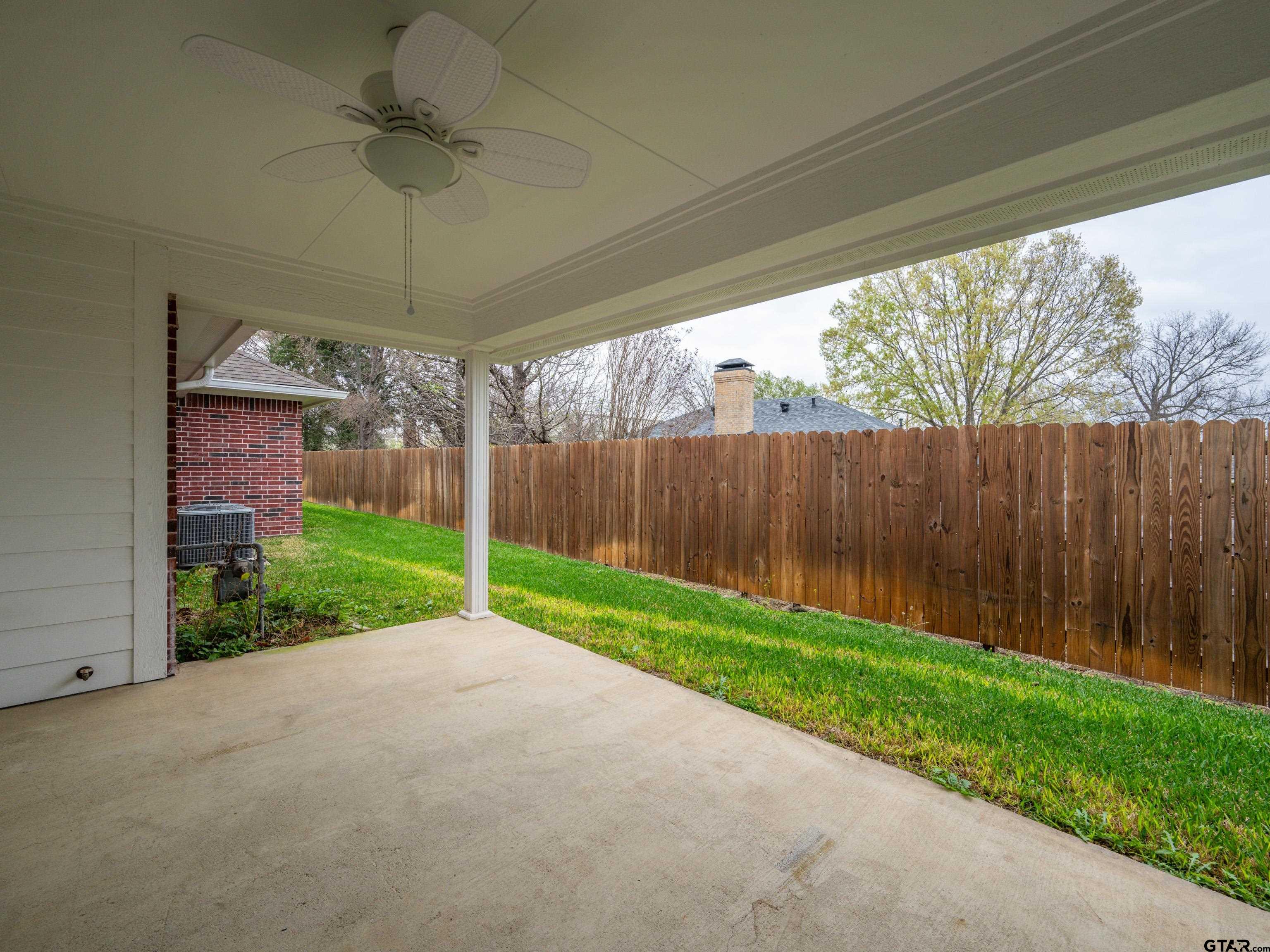 1521 Rice Road Tyler, TX 75703 - Photo 25 of 27 a view of a porch with furniture and garden