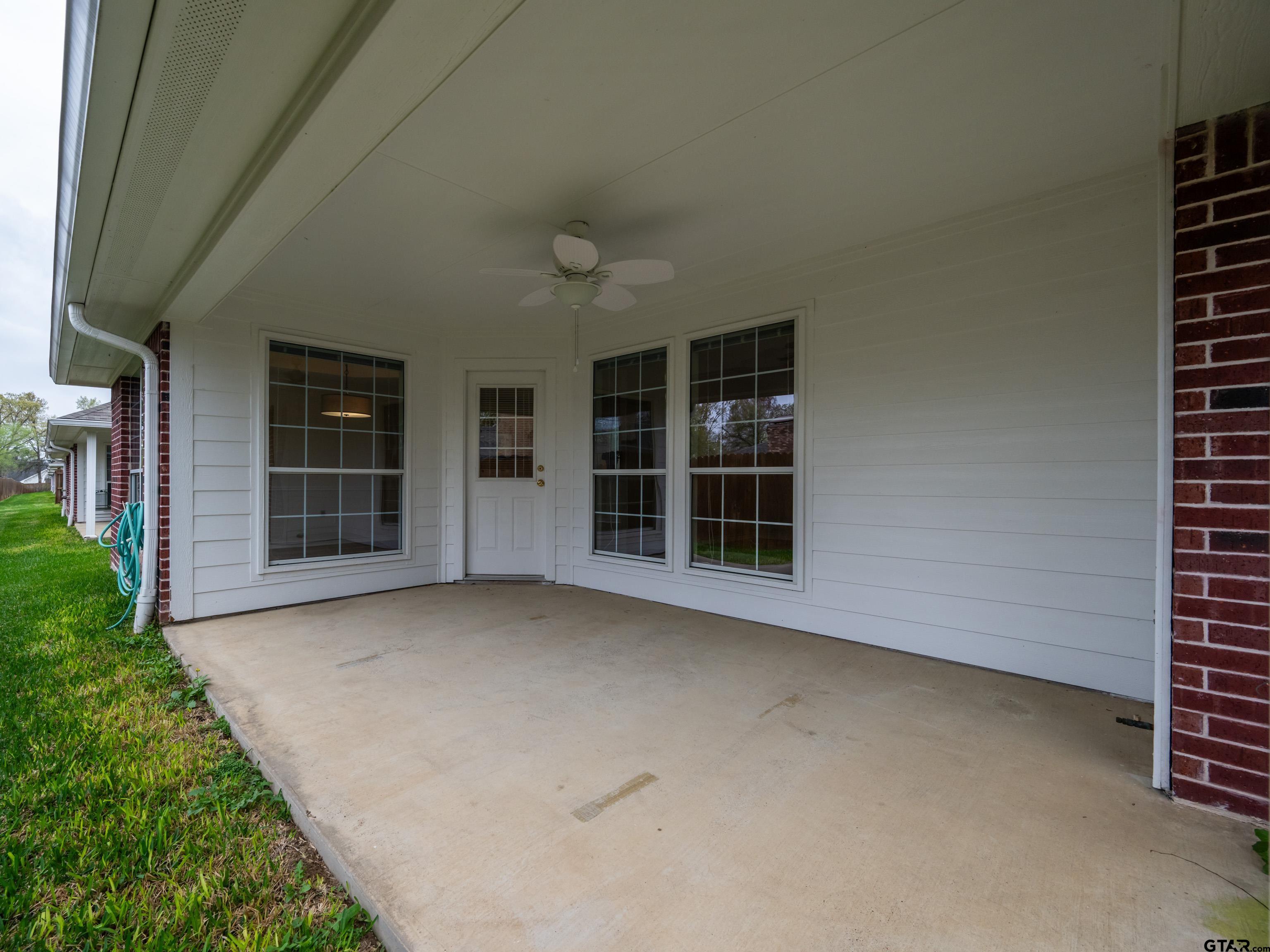 1521 Rice Road Tyler, TX 75703 - Photo 26 of 27 front view of a house with a yard