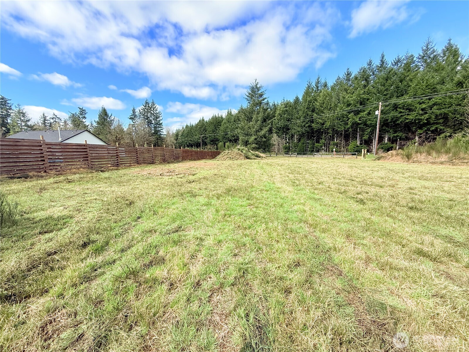 2126 Spencer Road Salkum, WA 98582 - Photo 15 of 24 a backyard of a house with lots of green space