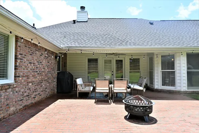 a building outdoor space with patio furniture