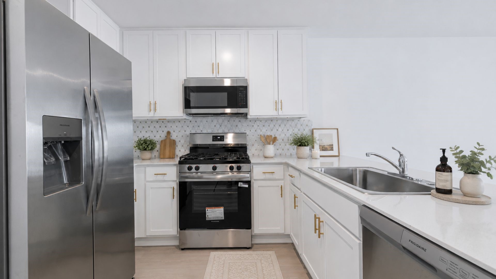 1531 Gentle Wind Court Angleton, TX 77515 - Photo 4 of 15 virtually staged - kitchen. + beautiful modern backsplash and cabinet hardware