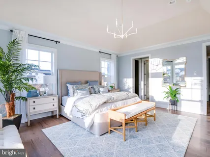 a bed room with a bed and a table