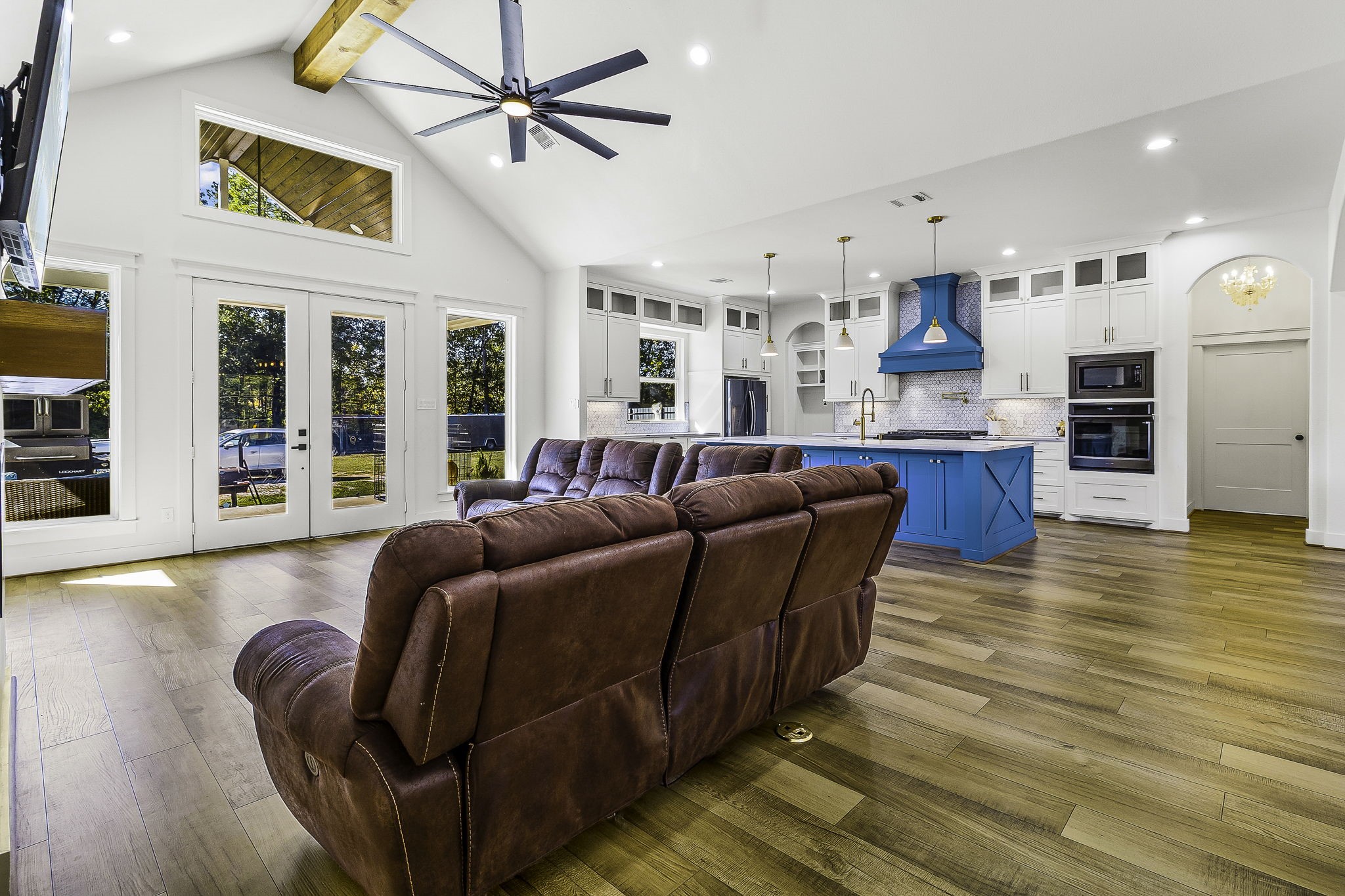 440 Farm To Market 223 Shepherd, TX 77371 - Photo 11 of 49 a living room with kitchen island furniture and a wooden floor