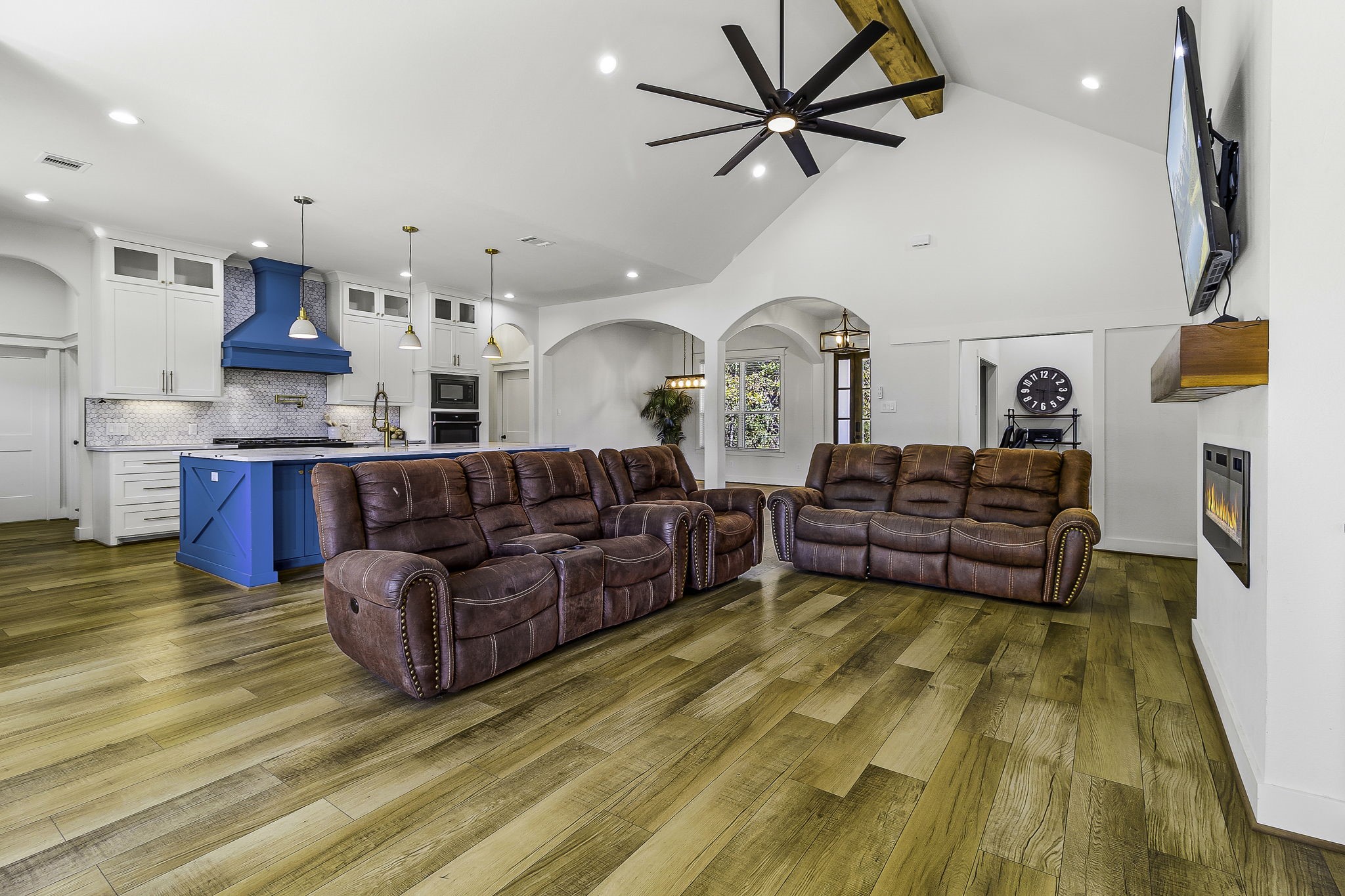 440 Farm To Market 223 Shepherd, TX 77371 - Photo 12 of 49 a living room with furniture fireplace and wooden floor
