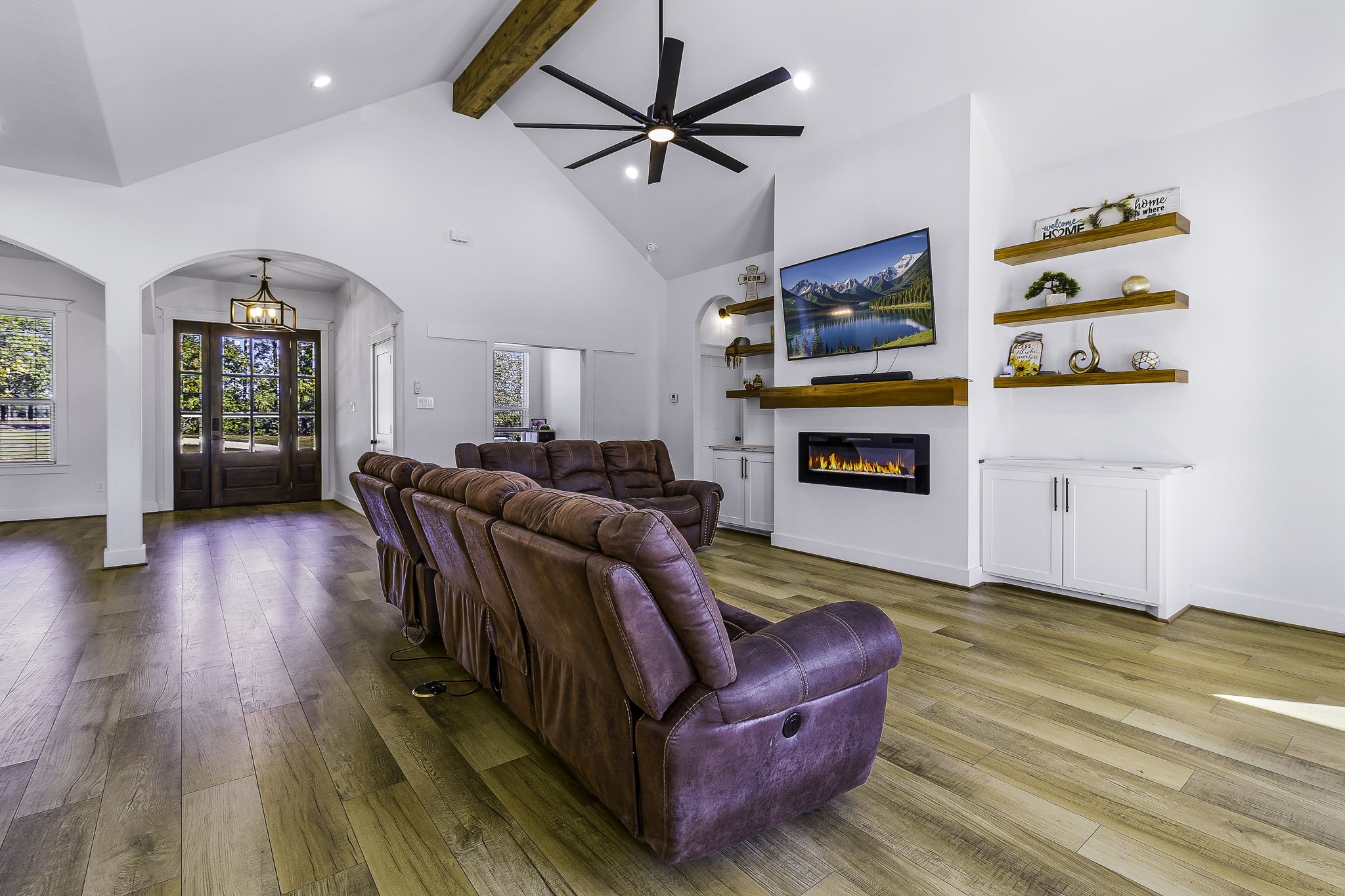 440 Farm To Market 223 Shepherd, TX 77371 - Photo 13 of 49 a living room with furniture and a flat screen tv
