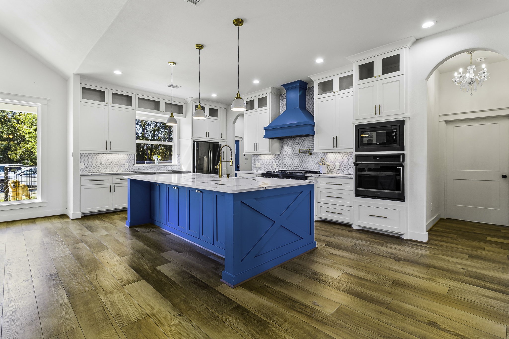 440 Farm To Market 223 Shepherd, TX 77371 - Photo 16 of 49 a kitchen with stainless steel appliances granite countertop a stove a sink and a refrigerator