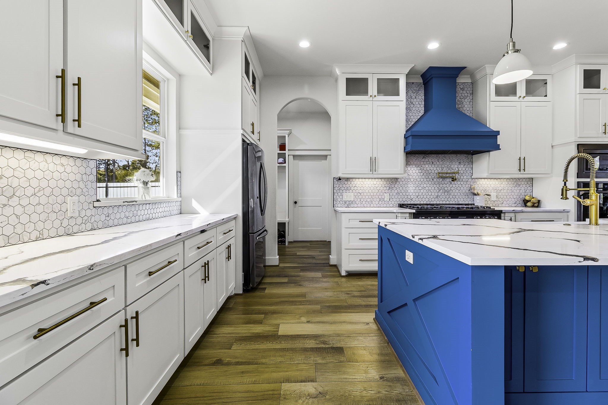 440 Farm To Market 223 Shepherd, TX 77371 - Photo 19 of 49 a kitchen with stainless steel appliances granite countertop a sink and a stove