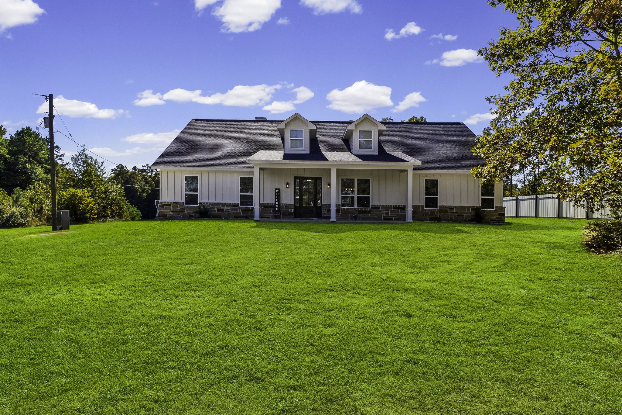 440 Farm To Market 223 Shepherd, TX 77371 - Photo 2 of 49 a view of a house with a big yard