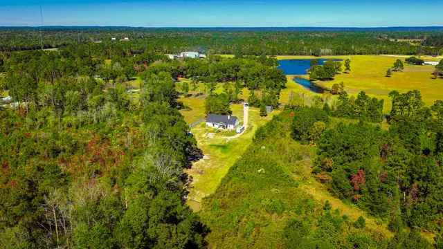 a view of a house with a big yard
