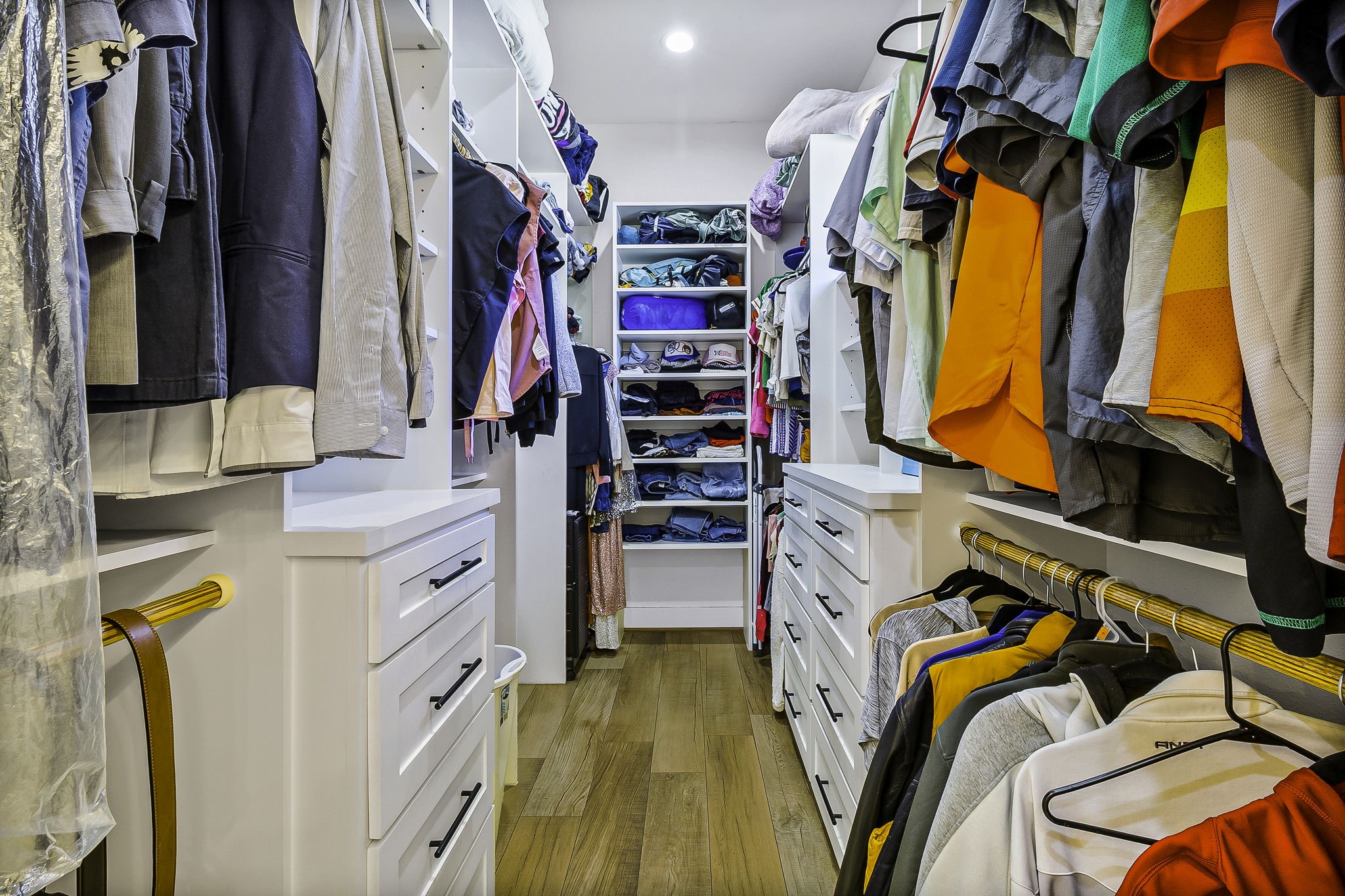 440 Farm To Market 223 Shepherd, TX 77371 - Photo 29 of 49 a view of walk in closet with clothes and shoes