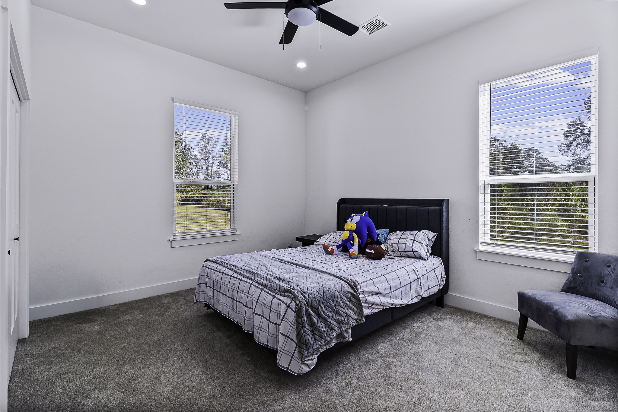 440 Farm To Market 223 Shepherd, TX 77371 - Photo 31 of 49 a bedroom with a bed couch and window