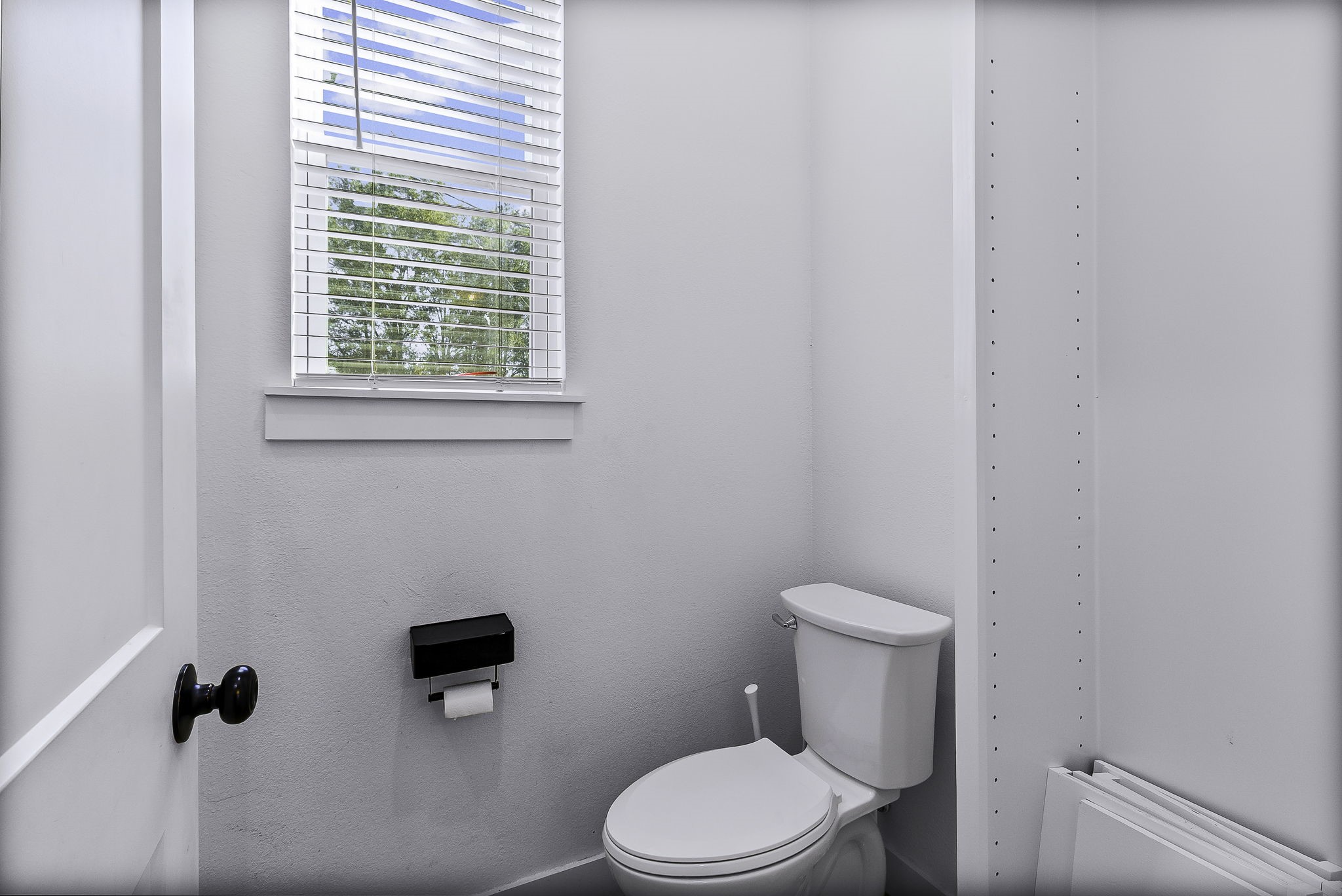 440 Farm To Market 223 Shepherd, TX 77371 - Photo 36 of 49 a white toilet sitting next to a bathroom sink