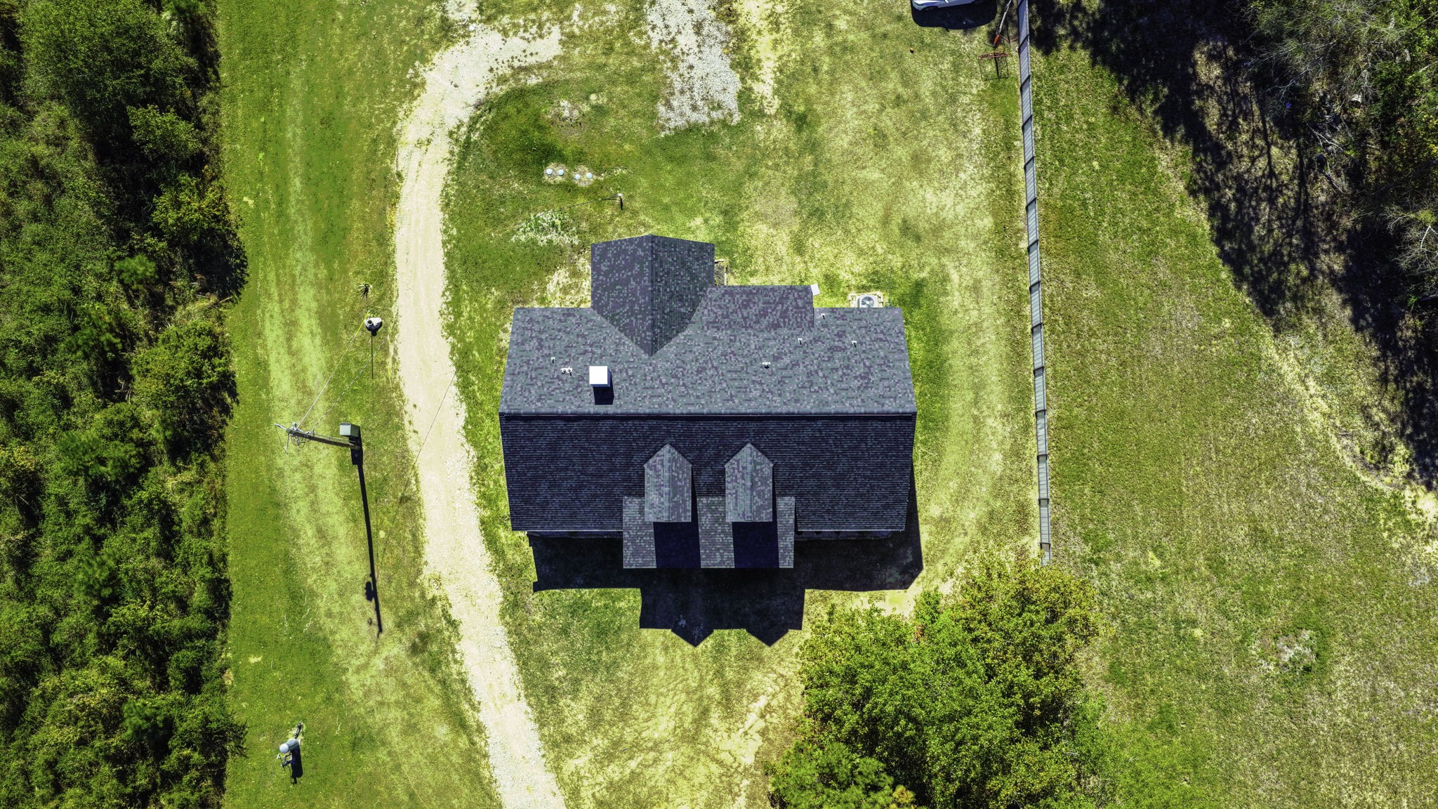 440 Farm To Market 223 Shepherd, TX 77371 - Photo 45 of 49 a view of a balcony with plants and large trees