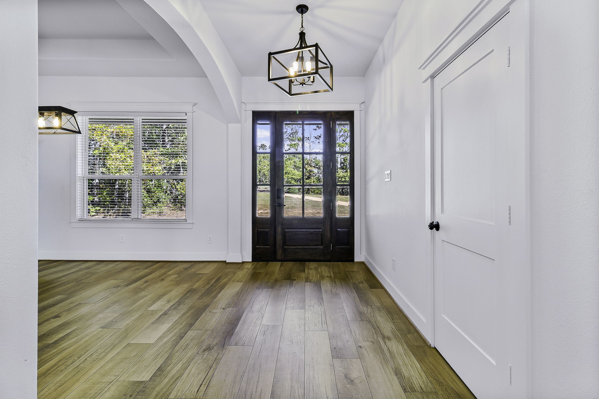 440 Farm To Market 223 Shepherd, TX 77371 - Photo 9 of 49 a view of hallway with wooden floor and a window