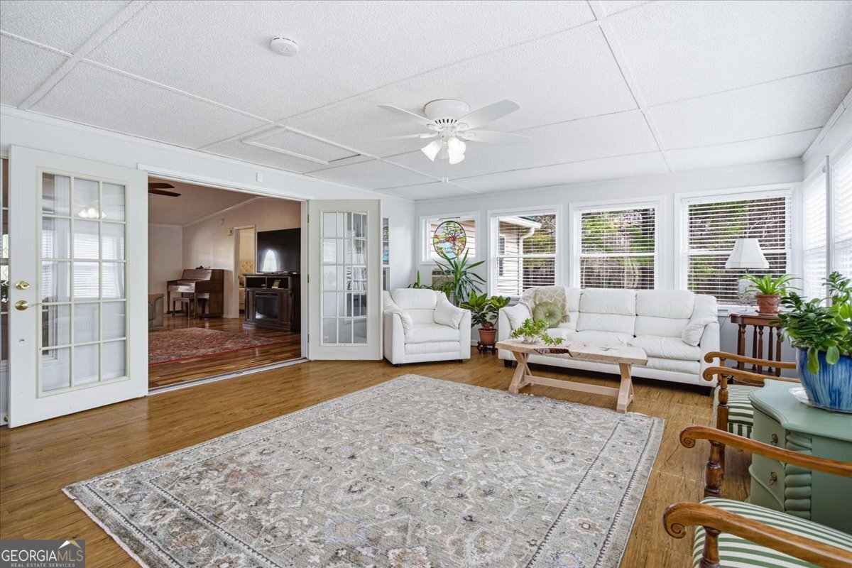 266 Payton Road Griffin, GA 30223 - Photo 12 of 48 a living room with furniture and a rug