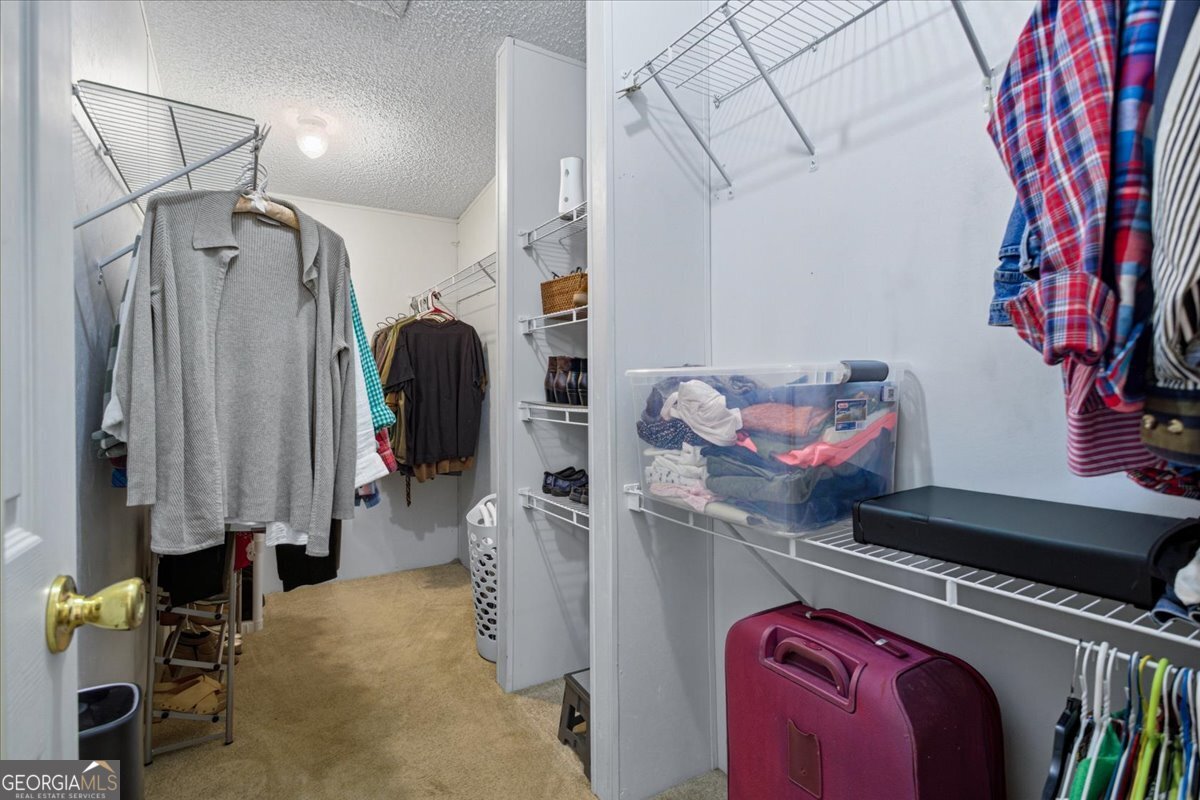266 Payton Road Griffin, GA 30223 - Photo 19 of 48 a utility room with dryer and washer