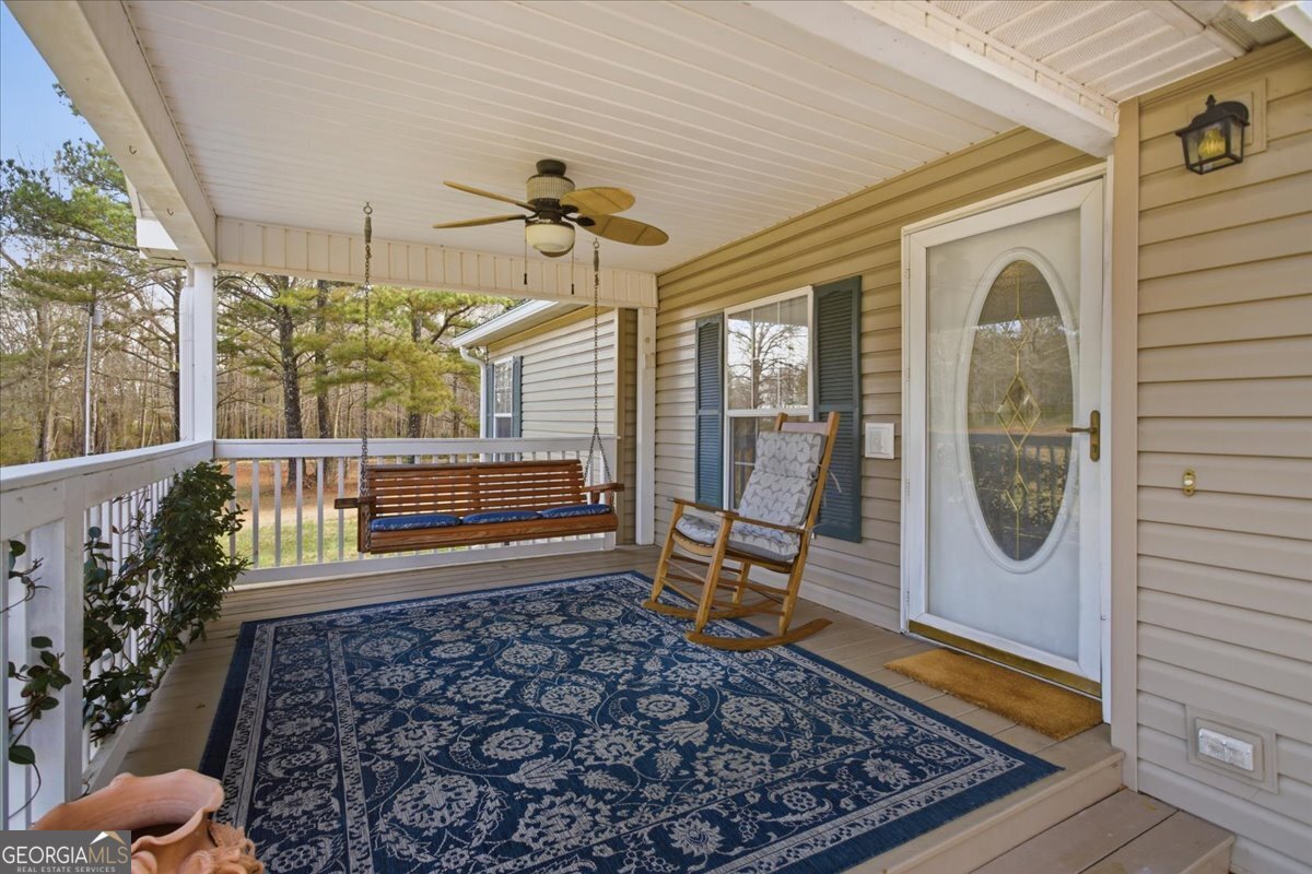 266 Payton Road Griffin, GA 30223 - Photo 3 of 48 a front view of a house with wooden floor
