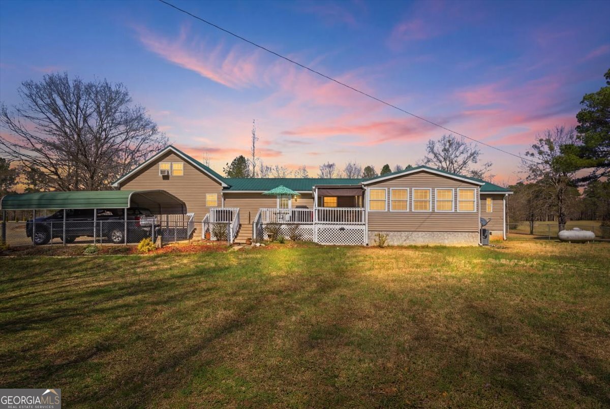 266 Payton Road Griffin, GA 30223 - Photo 32 of 48 a front view of a house with a yard