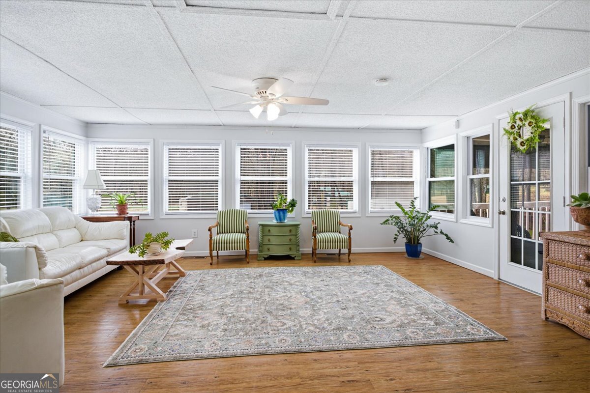 266 Payton Road Griffin, GA 30223 - Photo 5 of 48 a living room with furniture and a table