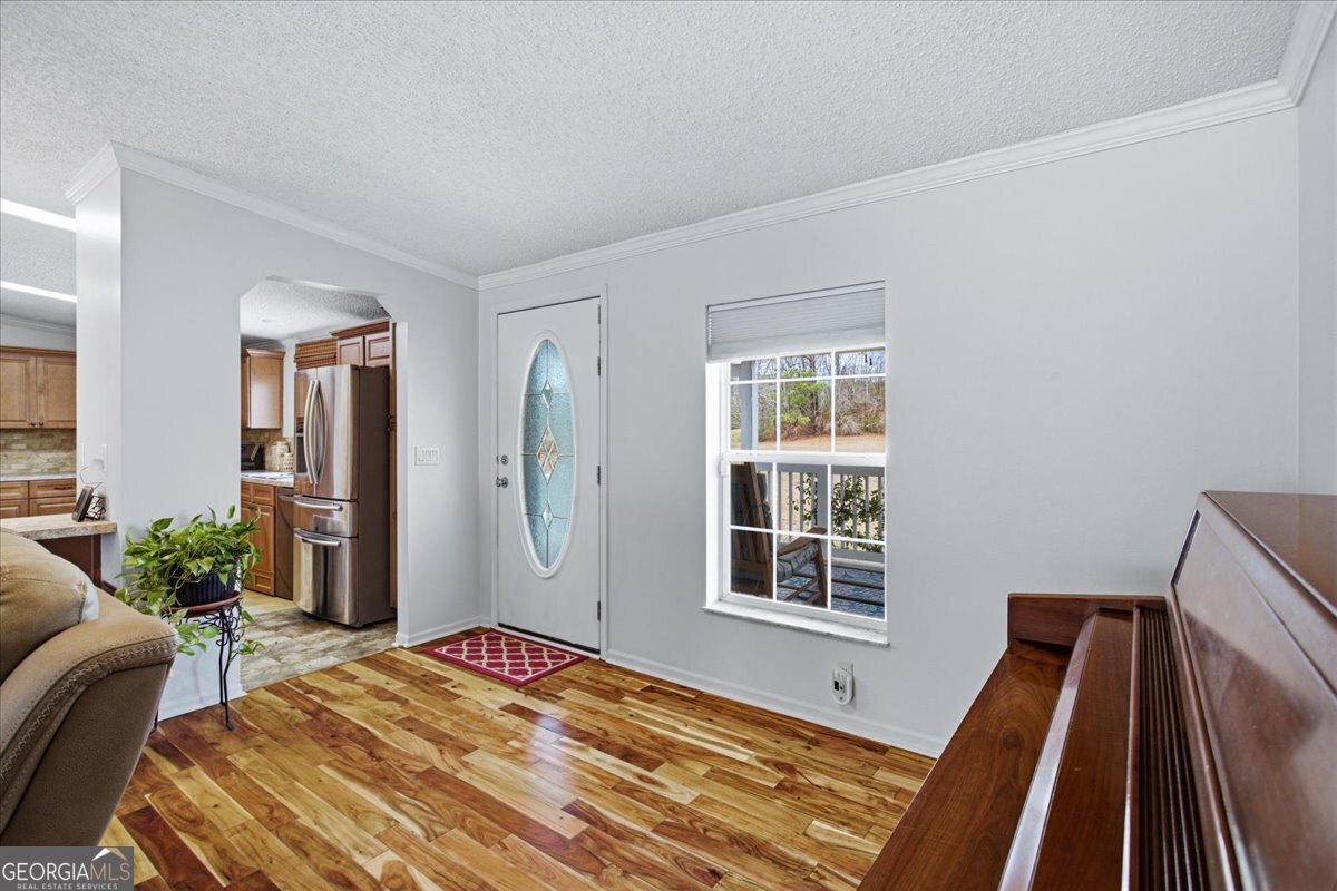 266 Payton Road Griffin, GA 30223 - Photo 10 of 48 a bedroom with a bed and a window