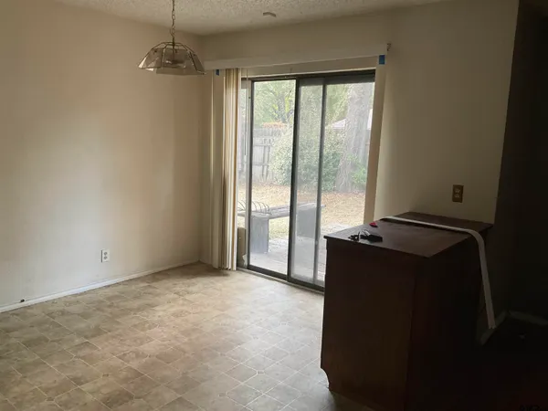 a living room with windows