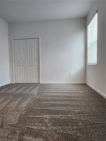 a view of a room with an empty space