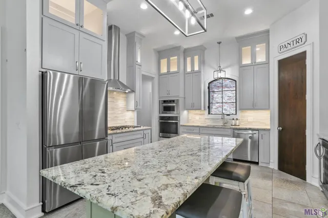 $572,000 | 13579 Bluff Point Drive, Prairieville, LA 70769