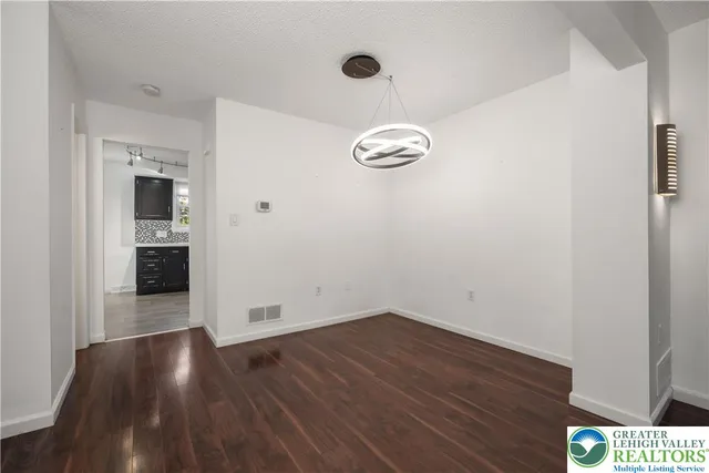 an empty room with cabinet