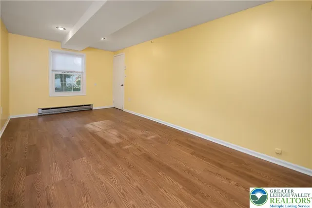 a view of mountain view with wooden fence