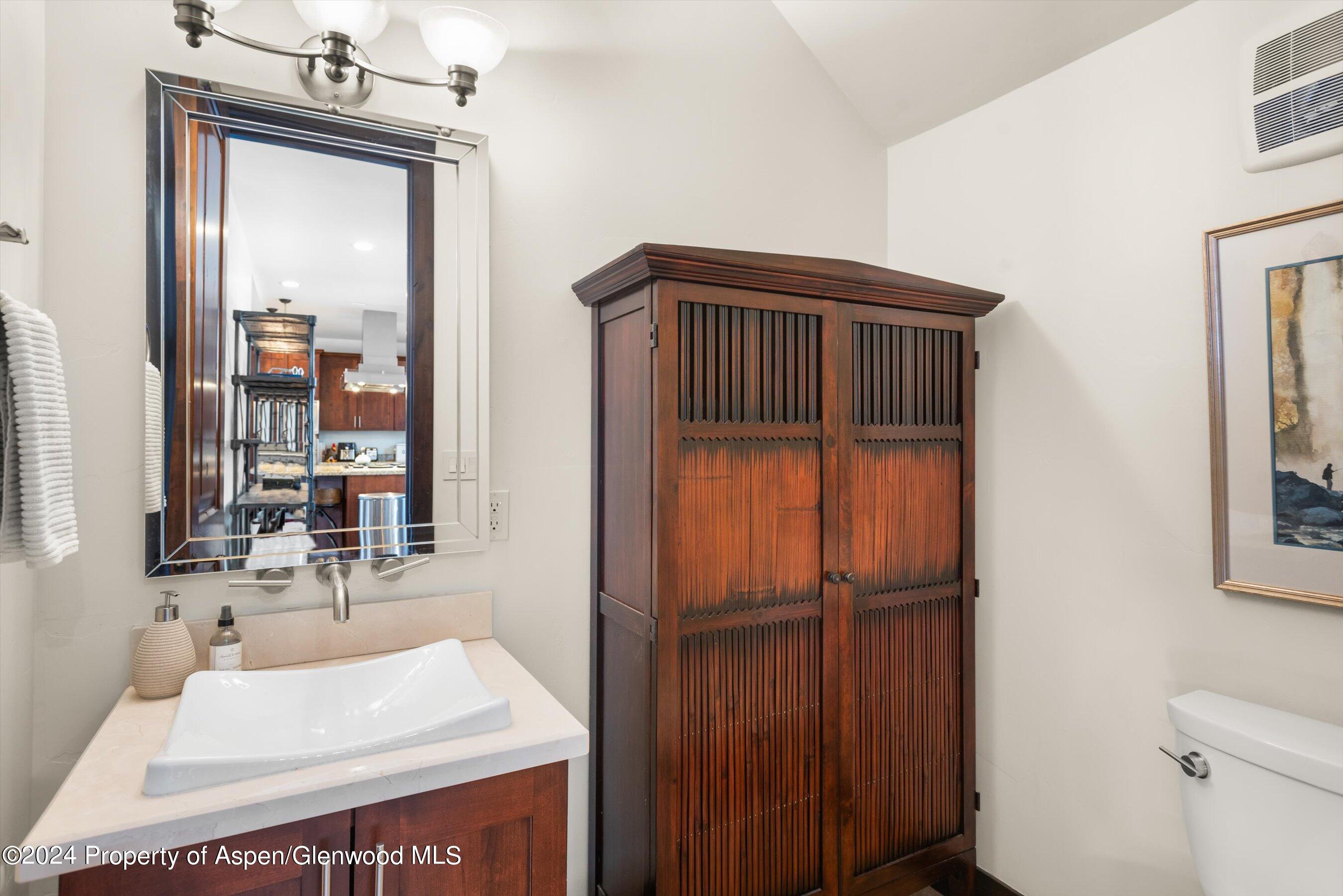 333 Sopris Circle Basalt, CO 81621 - Photo 19 of 57 a bathroom with a sink a toilet and shower