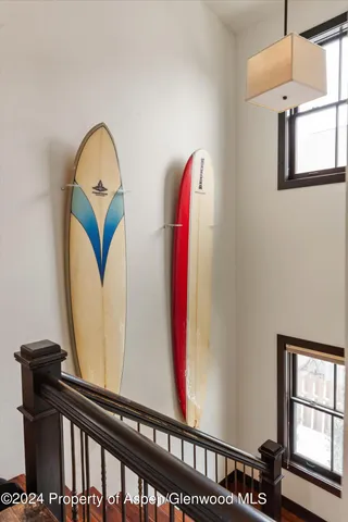 a workspace with furniture and a potted plant