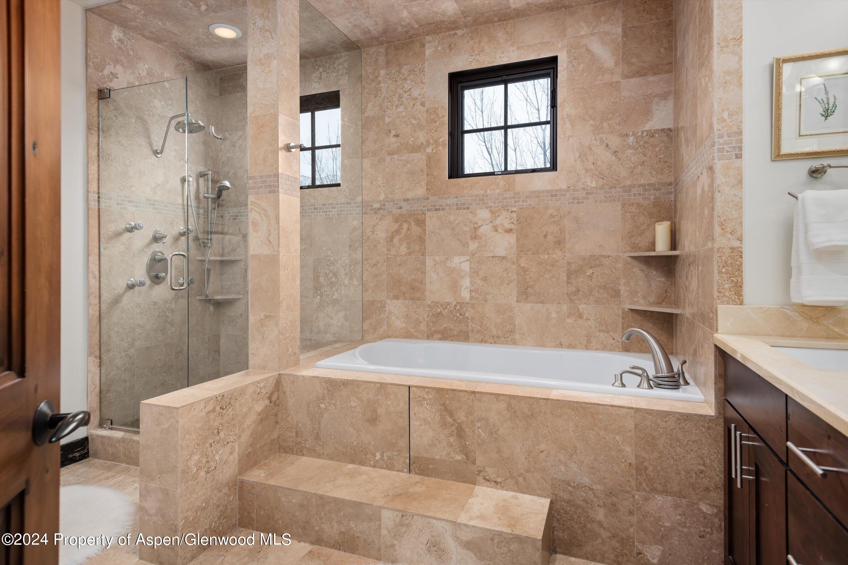 333 Sopris Circle Basalt, CO 81621 - Photo 29 of 57 a bathroom with a bathtub and a shower