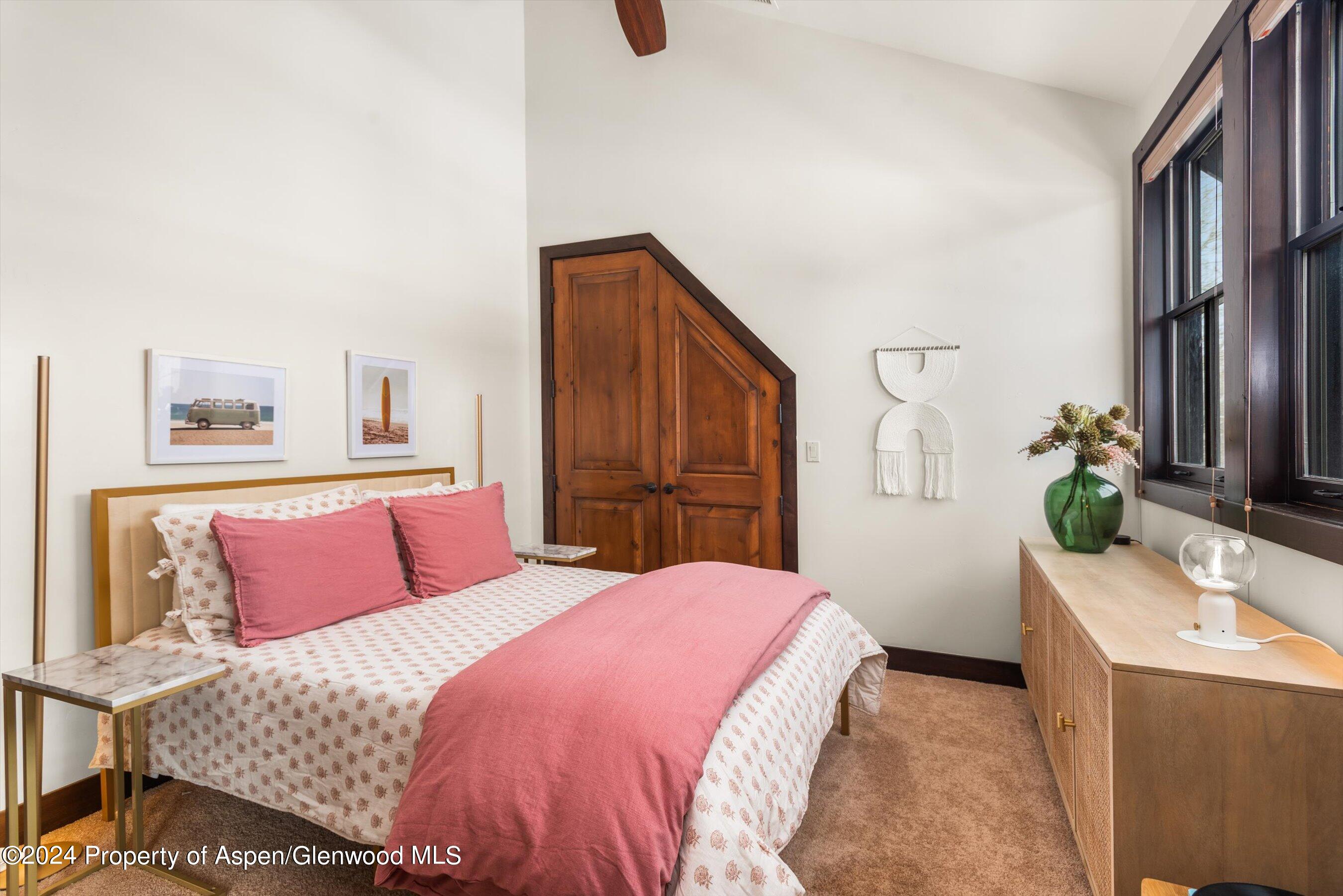 333 Sopris Circle Basalt, CO 81621 - Photo 32 of 57 a bedroom with a bed and dresser