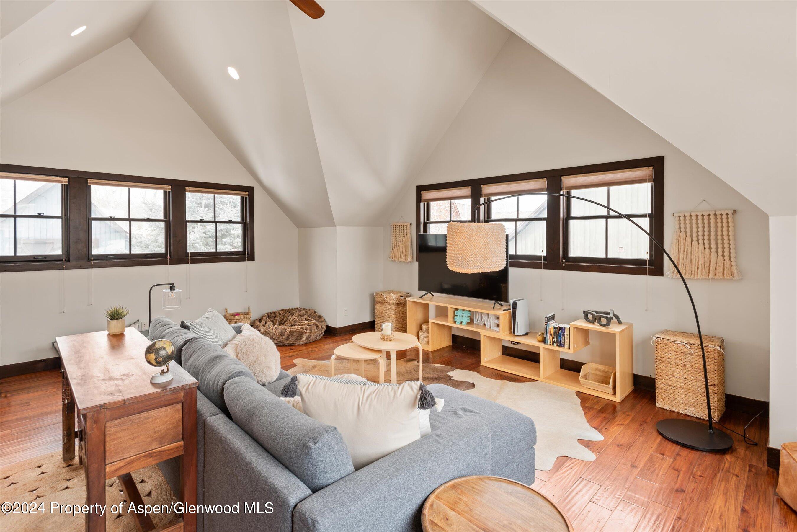 333 Sopris Circle Basalt, CO 81621 - Photo 41 of 57 a living room with furniture or window and a wooden floor