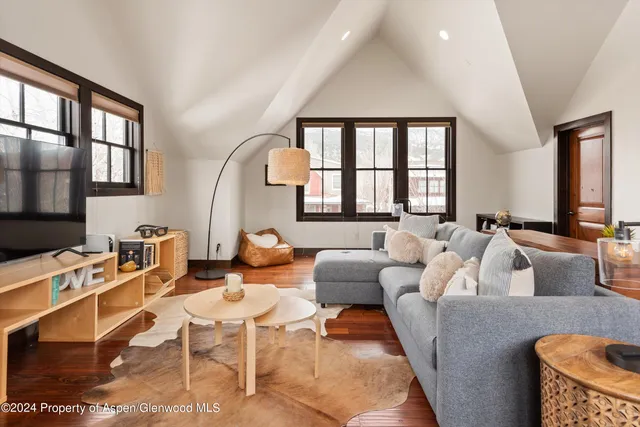 a view of backyard with table and chairs