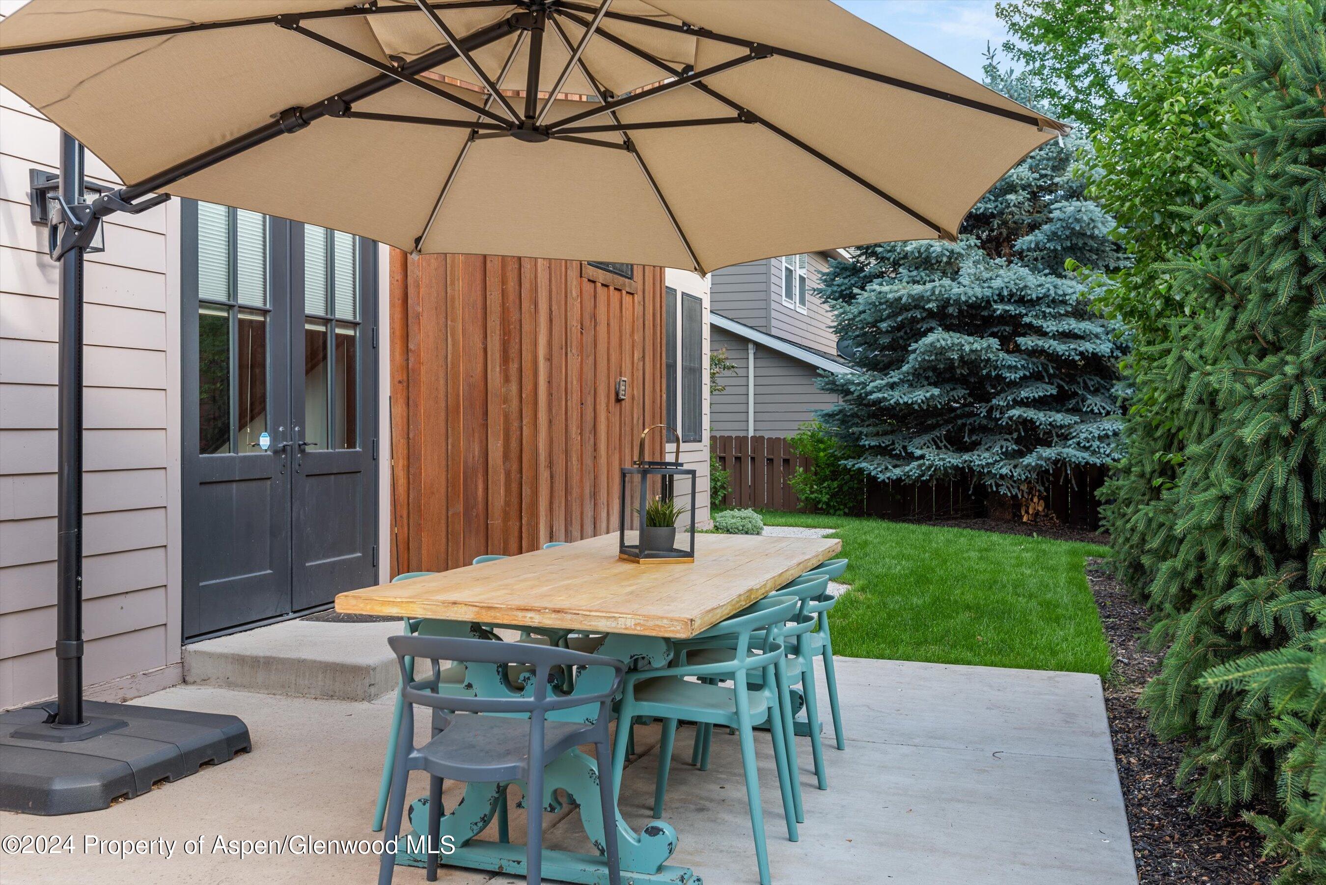 333 Sopris Circle Basalt, CO 81621 - Photo 51 of 57 a table and chairs in patio of the house