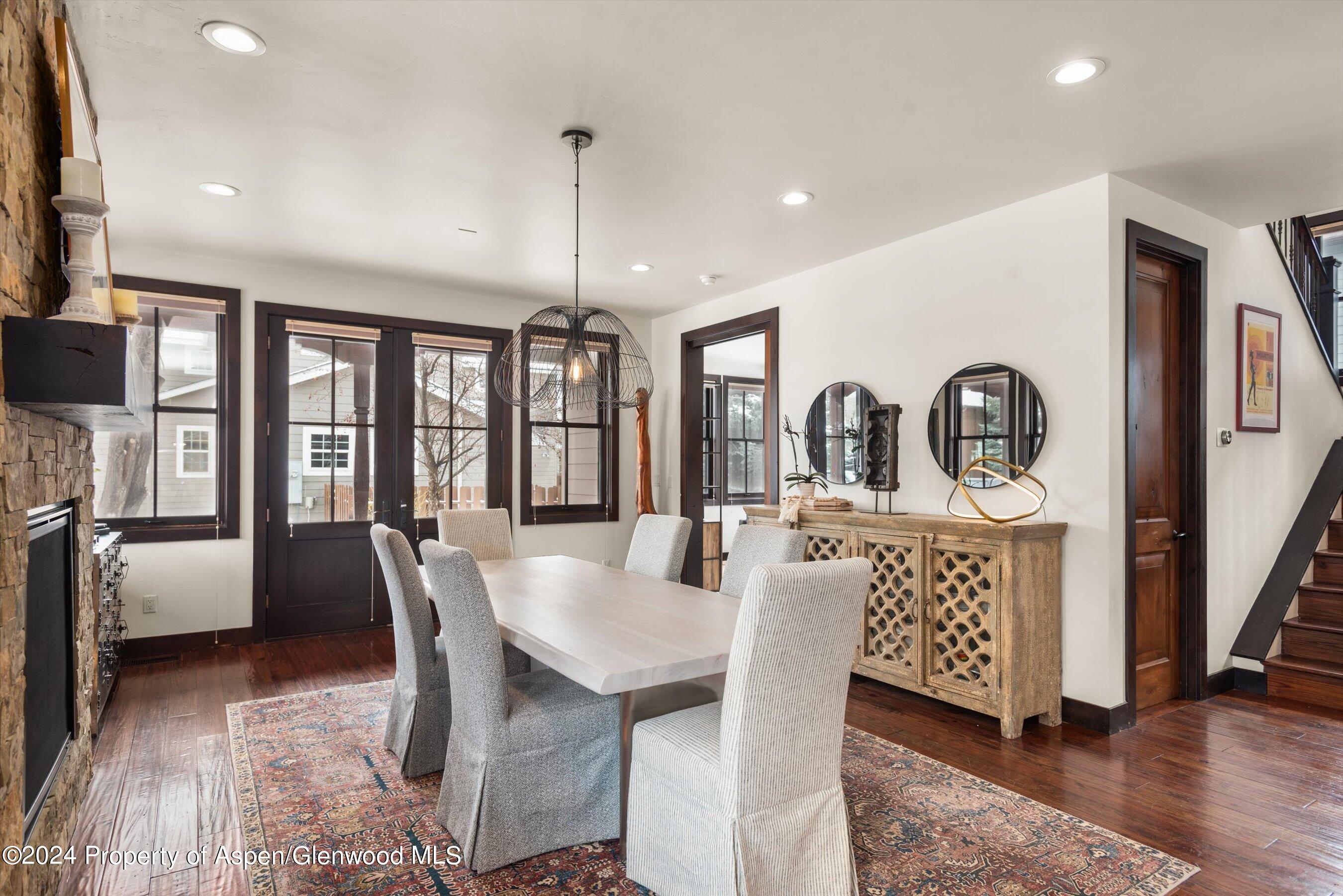 333 Sopris Circle Basalt, CO 81621 - Photo 8 of 57 a dining room with furniture window and wooden floor