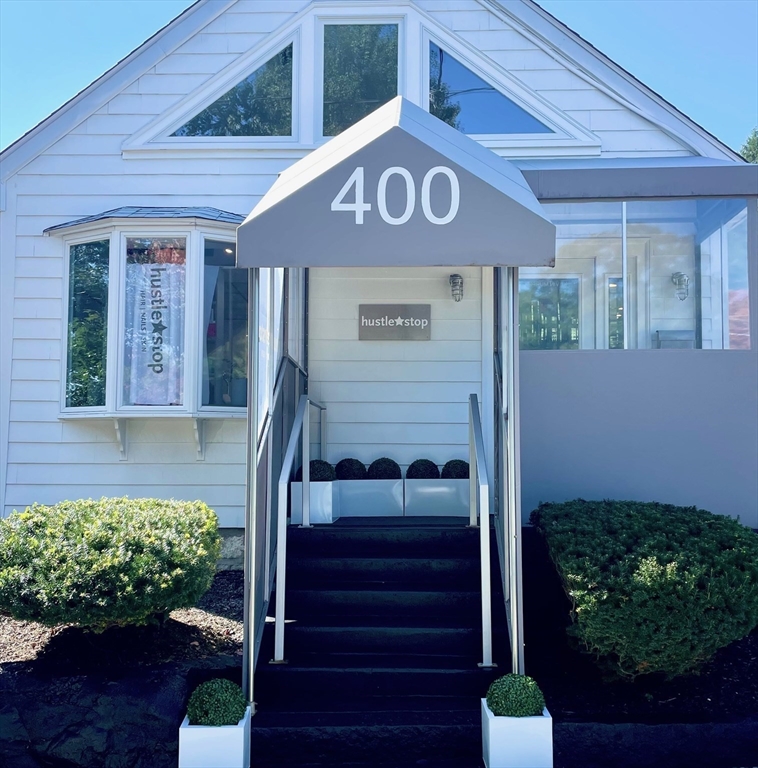400 Homer Street Newton, MA 02459 - Photo 1 of 4 a front view of a house with a yard